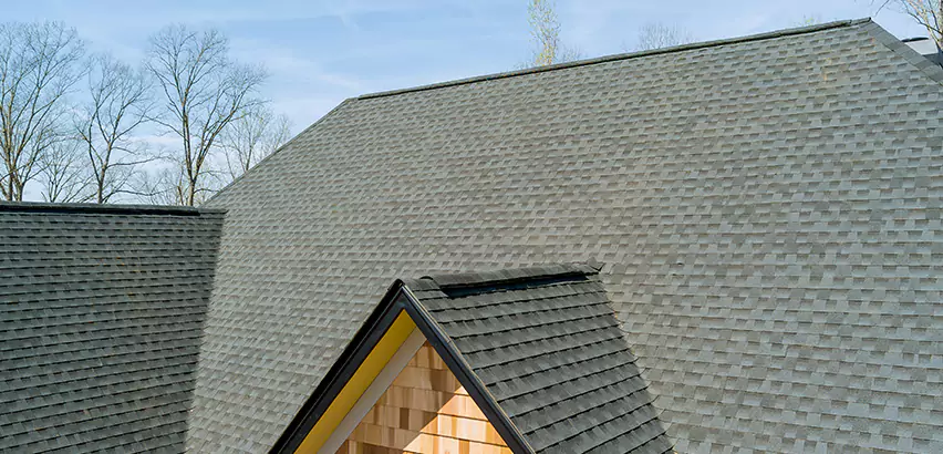 Replacing Vinyl Siding With Cedar Shingles in Huntley