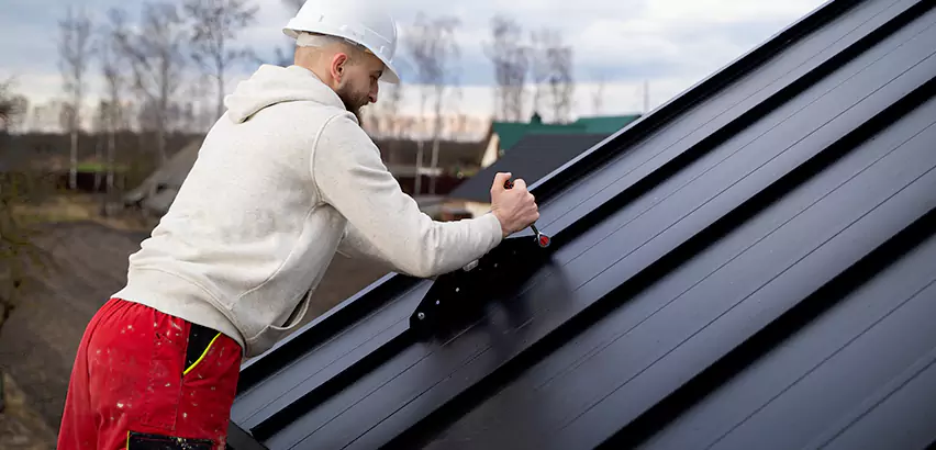Tin Roof Ridge Cap Installation in Huntley
